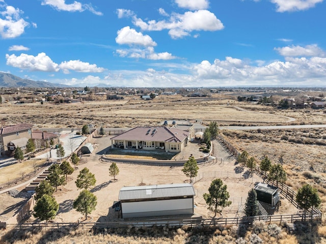 drone / aerial view featuring a mountain view