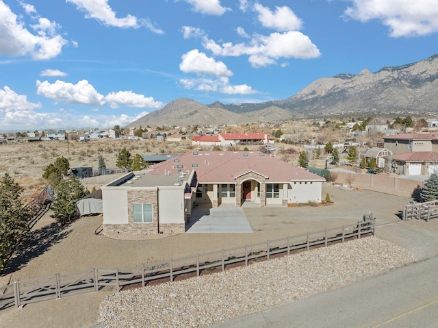 view of front of property with a mountain view