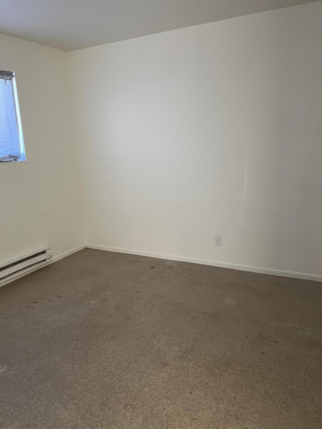 spare room with baseboard heating