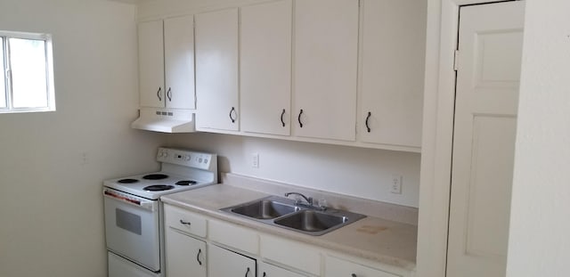 kitchen with sink, white cabinets, and white range with electric stovetop