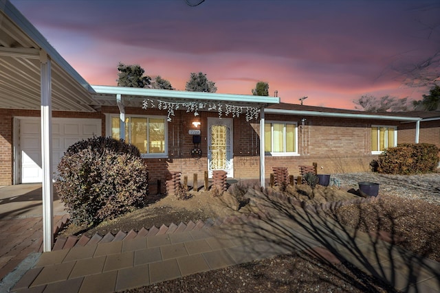 view of front of property with a garage