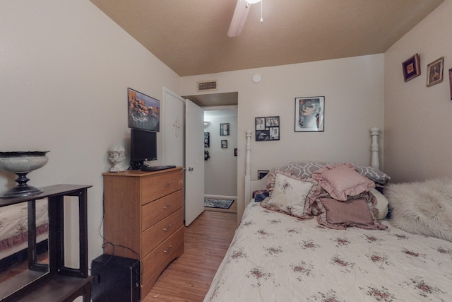 bedroom featuring ceiling fan and light wood-type flooring