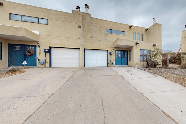 adobe home with a garage