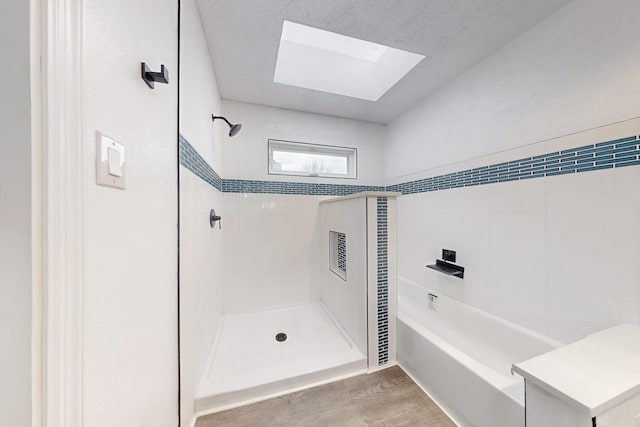 13428 Panorama Loop NE, Albuquerque, NM 87123 - bathroom with a shower, wood finished floors, and a skylight
