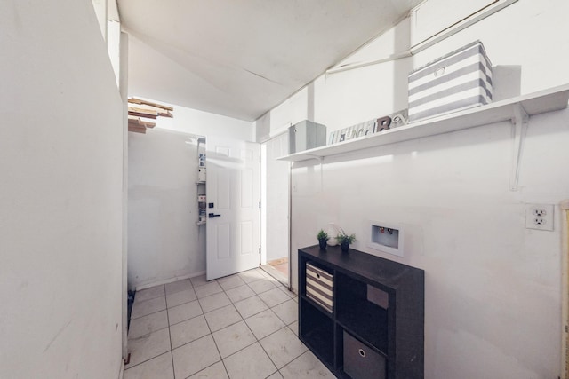 kitchen with light tile patterned flooring