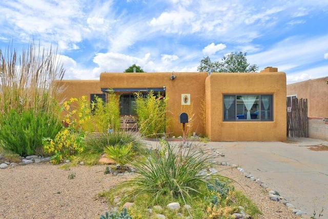 view of pueblo revival-style home