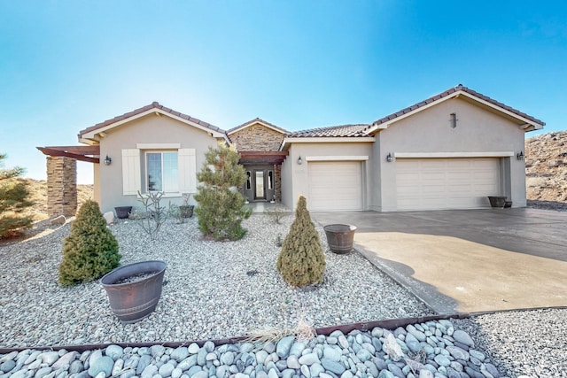 view of front of property featuring a garage