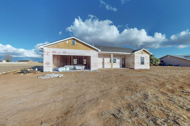 property under construction with an attached garage