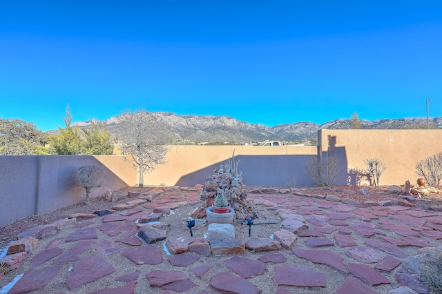 view of patio featuring a mountain view