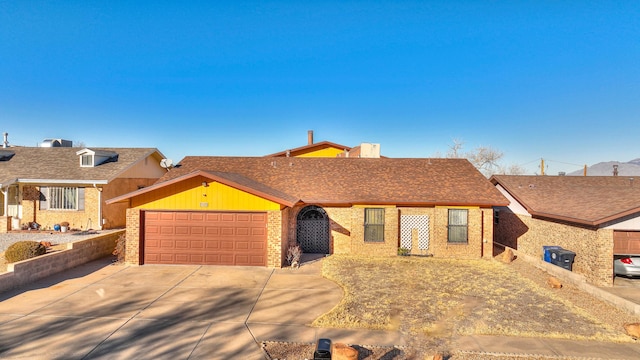 ranch-style home featuring a garage