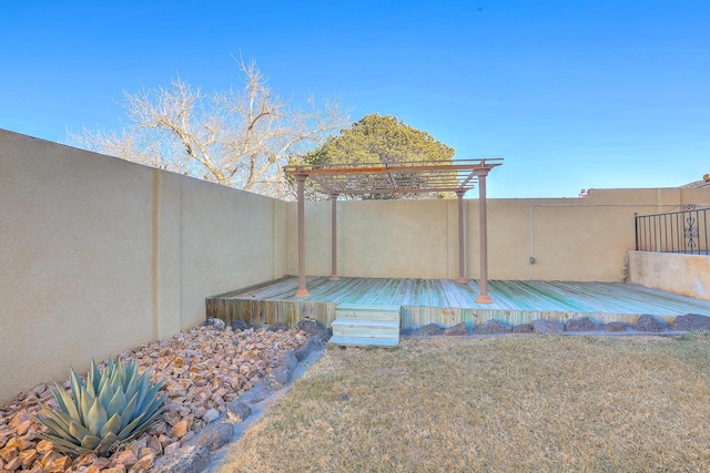 view of yard with a wooden deck