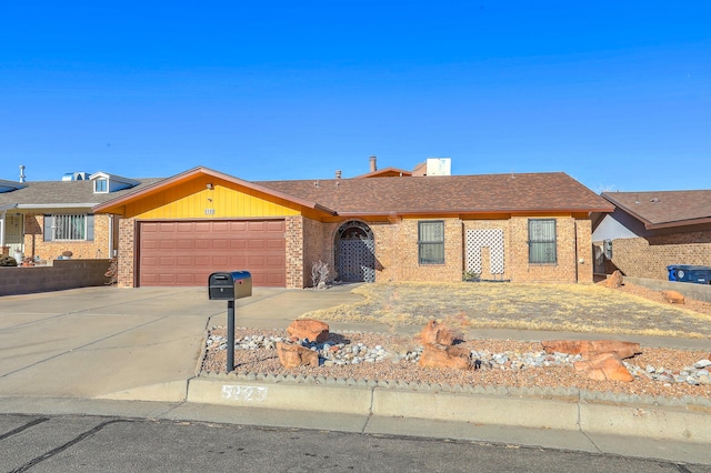 single story home with a garage