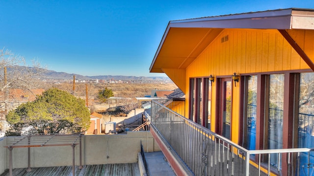 balcony featuring a mountain view