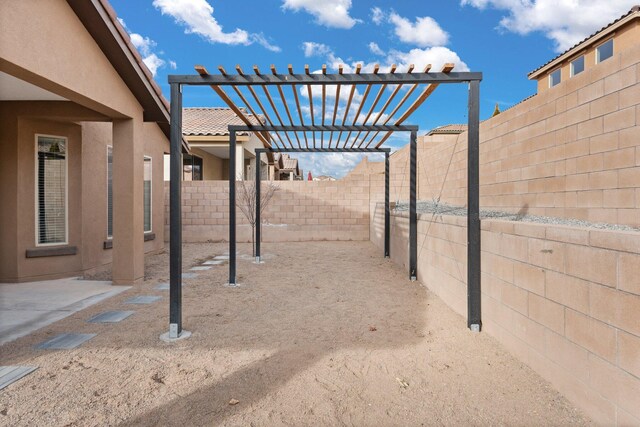 view of yard with a pergola