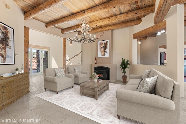 22 Del Charro Rd, Lamy, NM 87540 - tiled living room featuring wood ceiling, a chandelier, and beamed ceiling