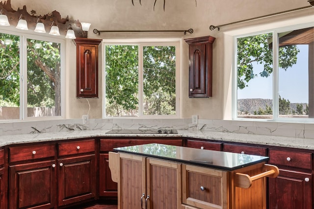 22 Del Charro Rd, Lamy, NM 87540 - kitchen featuring light stone countertops