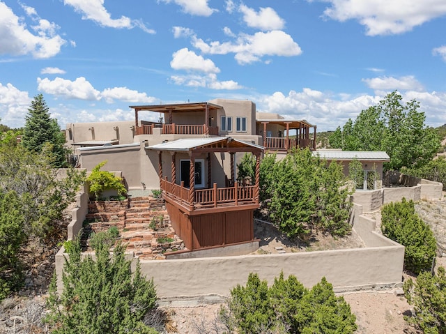 22 Del Charro Rd, Lamy, NM 87540 - view of front of home with a balcony