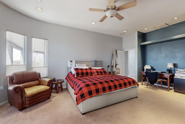 bedroom featuring light carpet and ceiling fan