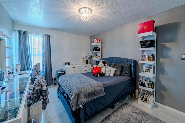 bedroom featuring a textured ceiling