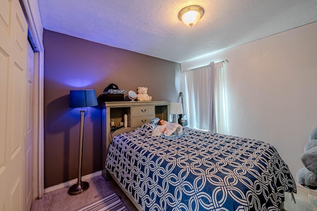 bedroom with a textured ceiling