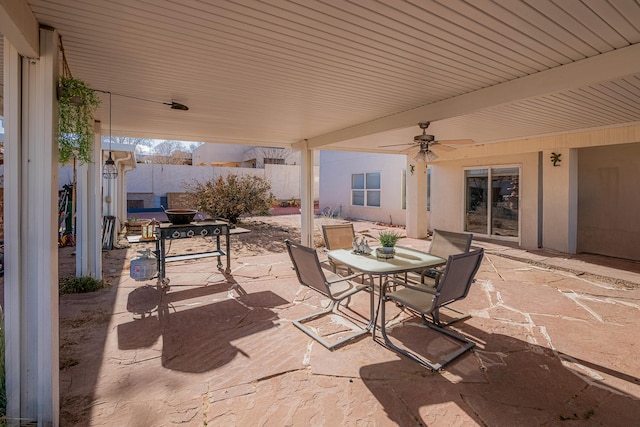 view of patio featuring ceiling fan