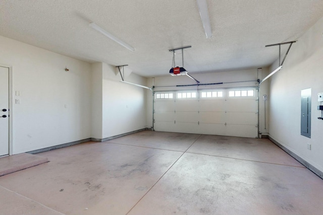 garage with baseboards, electric panel, and a garage door opener