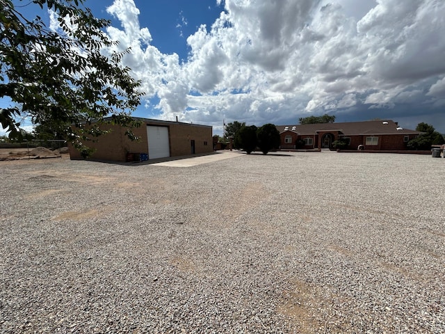 view of yard featuring a garage