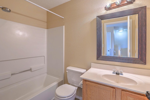 full bathroom with vanity, shower / bathing tub combination, and toilet