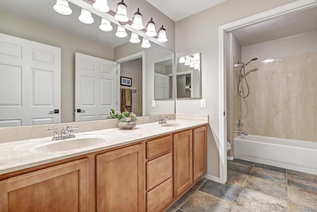 full bathroom featuring shower / washtub combination, vanity, and toilet