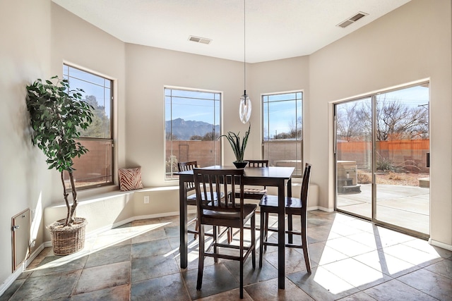 dining area with a mountain view