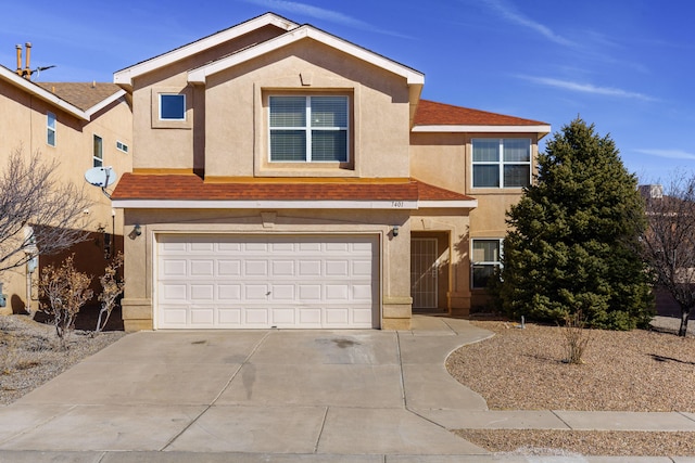 7401 Quartzite Ave NW, Albuquerque, NM 87114 - view of front of property with a garage