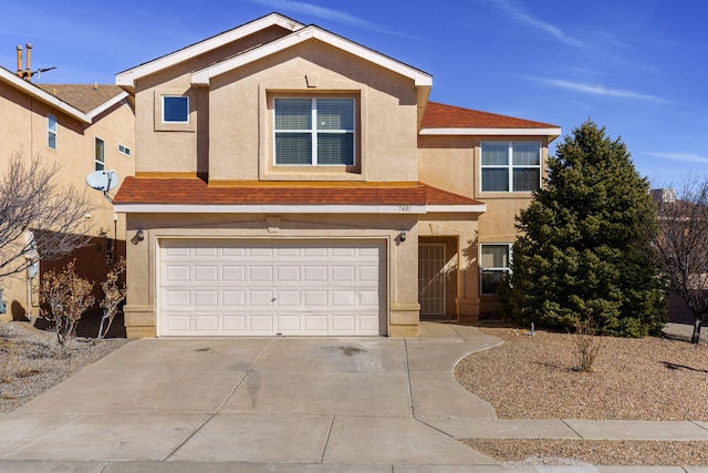 view of front of property with a garage