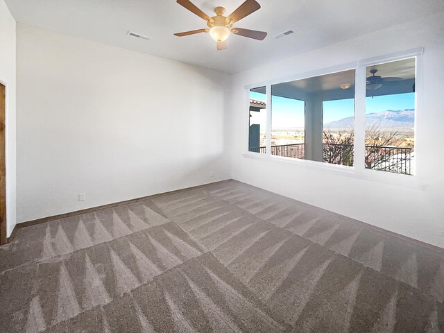 walk in closet featuring carpet