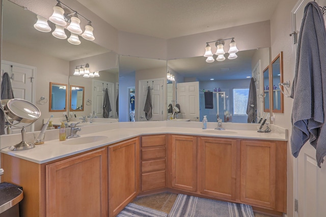 bathroom with vanity and tile patterned floors