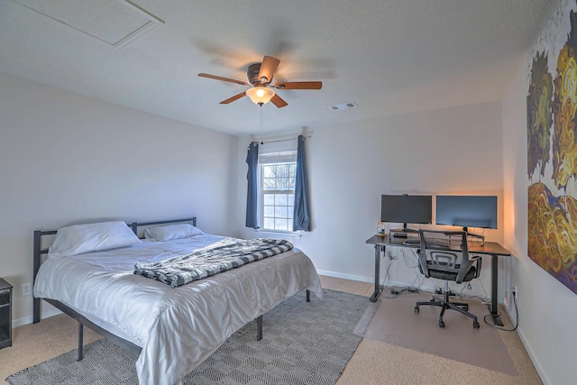 bedroom featuring a textured ceiling and ceiling fan