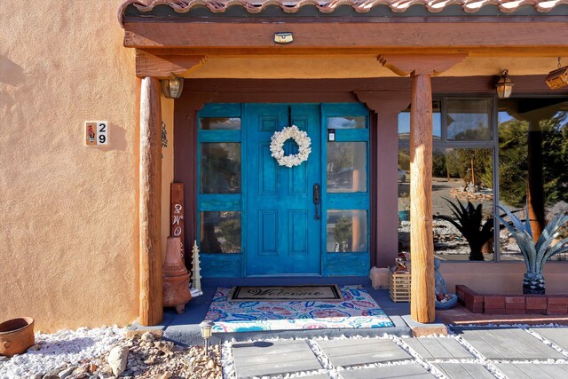 29 Sandia Ln, Placitas, NM 87043 - entrance to property with a tile roof and stucco siding