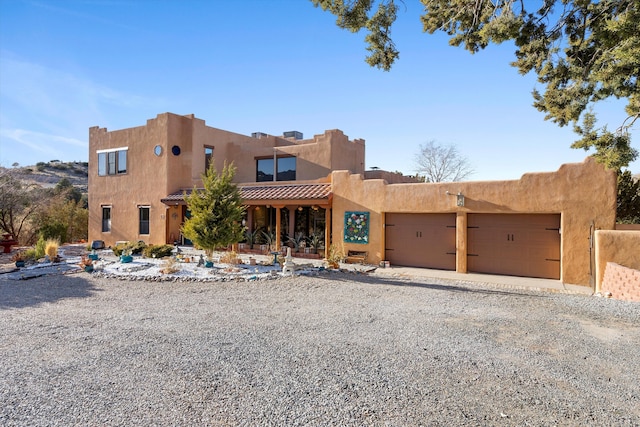 adobe home with a garage