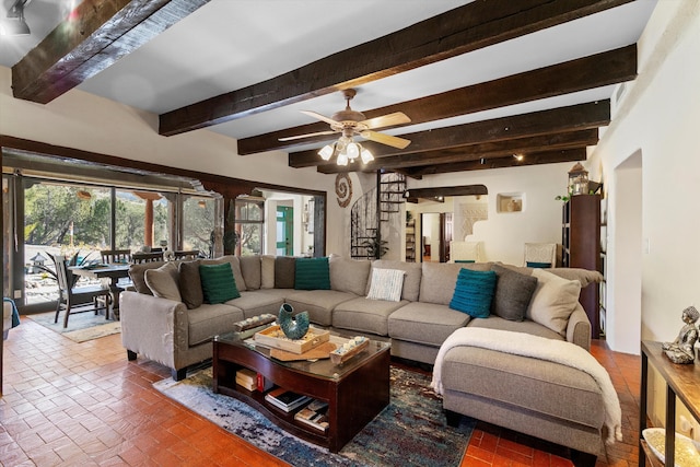 living room featuring ceiling fan and beam ceiling