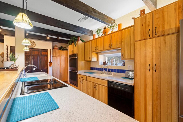 kitchen featuring pendant lighting, beamed ceiling, sink, and black appliances