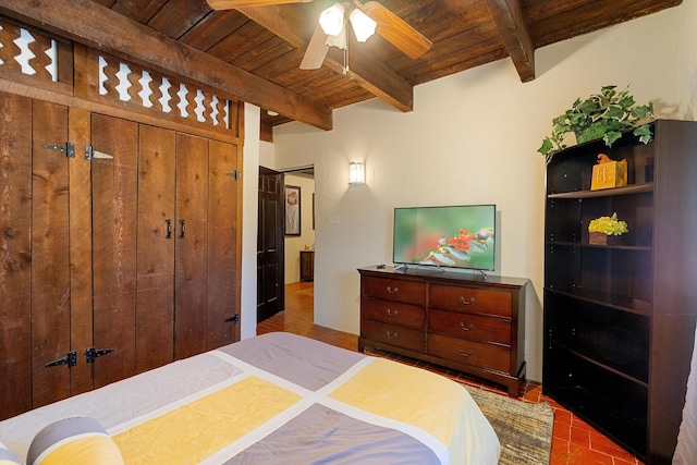 29 Sandia Ln, Placitas, NM 87043 - bedroom featuring wood ceiling, brick floor, and beam ceiling