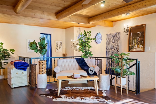 living room featuring a notable chandelier, dark wood-type flooring, wooden ceiling, and beamed ceiling