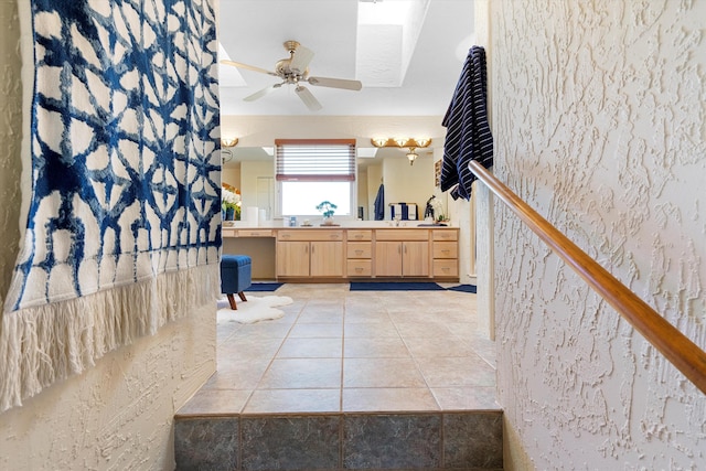 bathroom featuring vanity, tile patterned floors, and ceiling fan