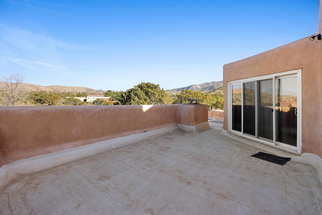 view of patio featuring a mountain view