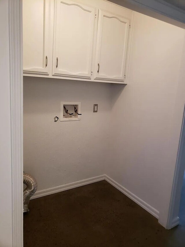 laundry area with cabinets and hookup for a washing machine