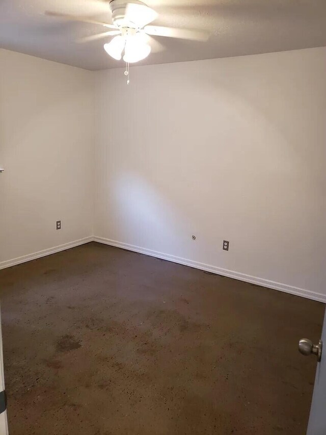 unfurnished room with ceiling fan