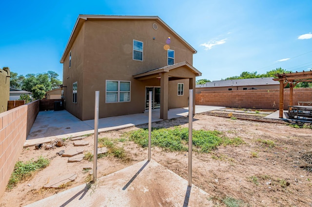 rear view of house featuring a patio area