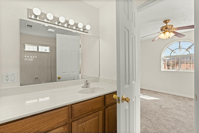 bathroom featuring ceiling fan and vanity