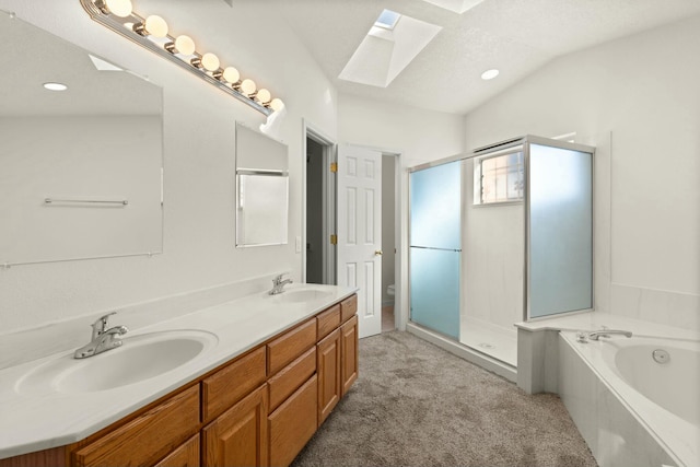 full bathroom with vanity, vaulted ceiling with skylight, toilet, and separate shower and tub