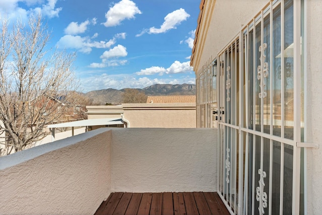 balcony featuring a mountain view