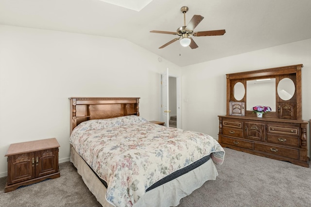 bedroom with ceiling fan, light colored carpet, and lofted ceiling